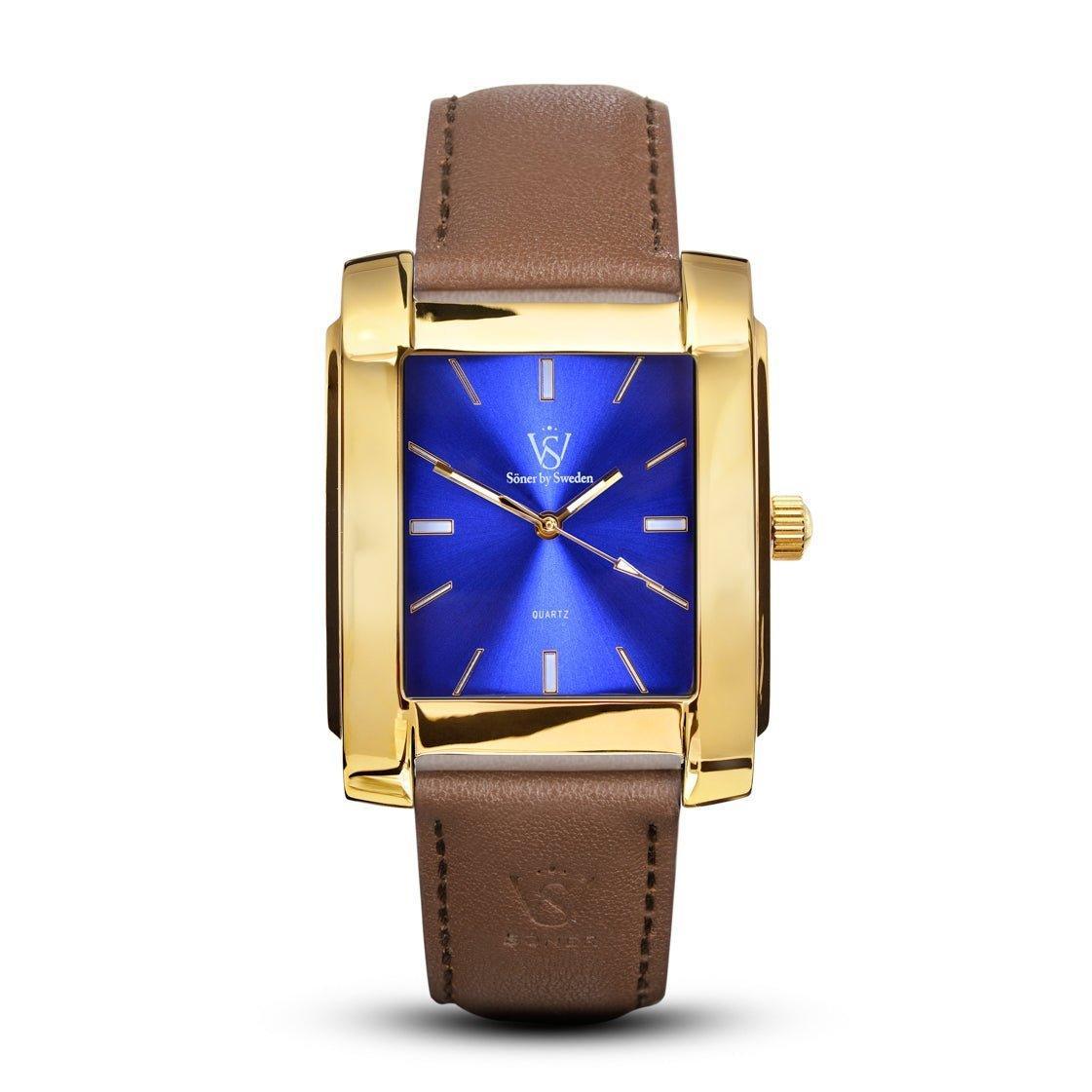 The Legacy Afable is a luxurious rectangular wristwatch that features a gold-tone case, blue dial, and minimalist hour markers. It comes with a brown leather strap and classic design, seamlessly blending elegance with modern flair reminiscent of the exquisite timepieces from Söner. Plus, it boasts a 3-year battery for long-lasting performance.