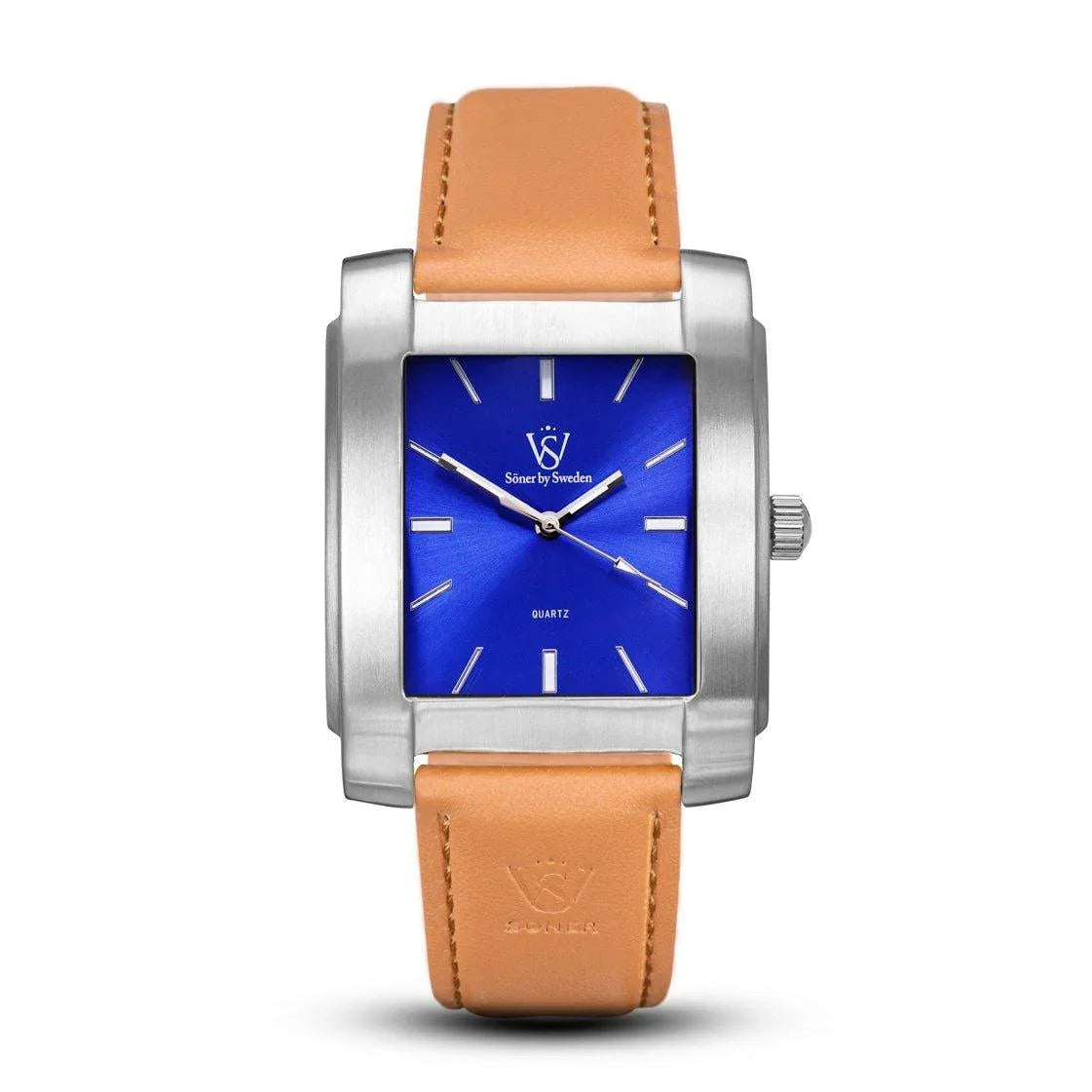 The Legacy Majorca watch, crafted by Söner, showcases a silver rectangular design with a blue face and minimalist features. It is elegantly paired with a light brown leather strap and includes simple hour markers and a single crown on the right, offering timeless elegance.
