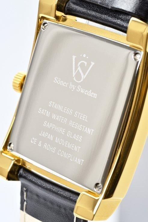 The Legacy Mercado (3-year Battery) watch from Söner boasts a gold-colored frame and a black leather strap. The engraved text on the back includes: Söner by Sweden, Stainless Steel, 5ATM Water Resistant, Sapphire Glass, Japan Movement, and is CE & ROHS Compliant.