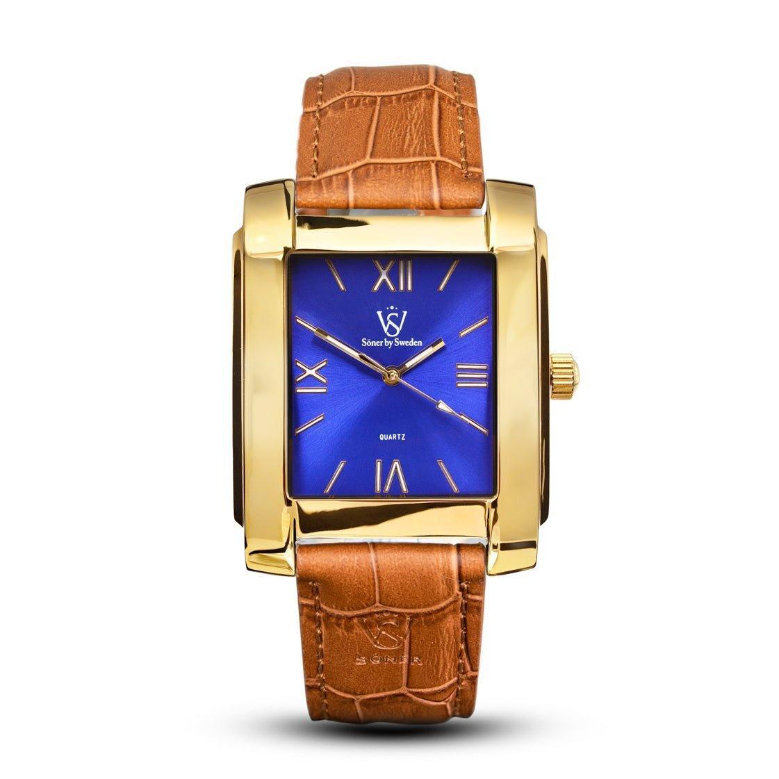 Polished gold rectangular Legacy Mercado watch with a blue sunburst dial, Roman numerals, and a tan leather strap.