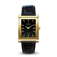 A rectangular gold wristwatch with a black leather strap. The watch face is black with simple gold hour markers and hands.