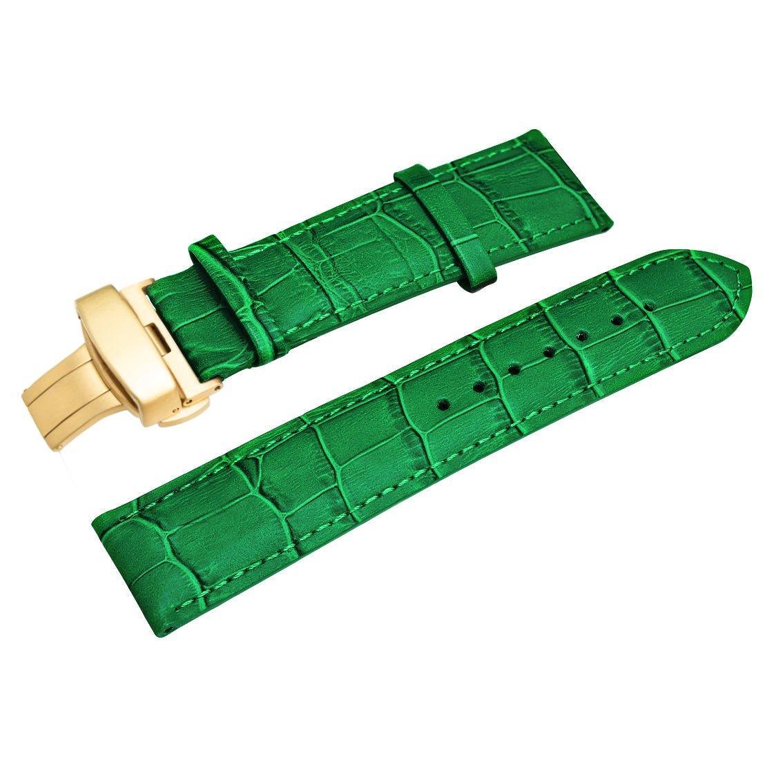 The HERITAGE Forest Croc (22mm) watch strap is crafted from vibrant green alligator leather with a textured pattern. It features a gold-tone deployment clasp, multiple adjustment holes, and a pointed end, all accentuated by fine stitching along the edges.