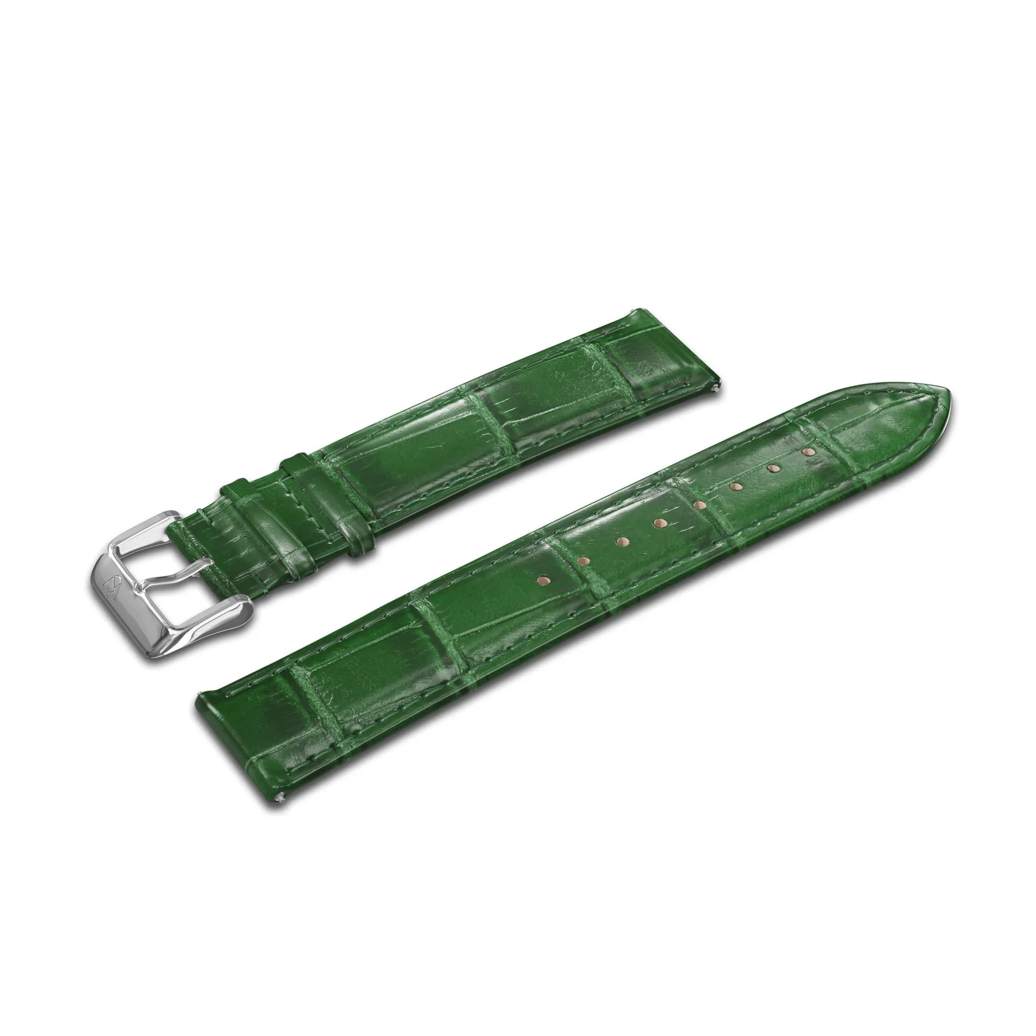 The GATSBY Forest Croc (20mm) watch strap, featuring a green leather design with a crocodile texture, is in two sections. One section includes a silver buckle, while the other is perforated for size adjustments.