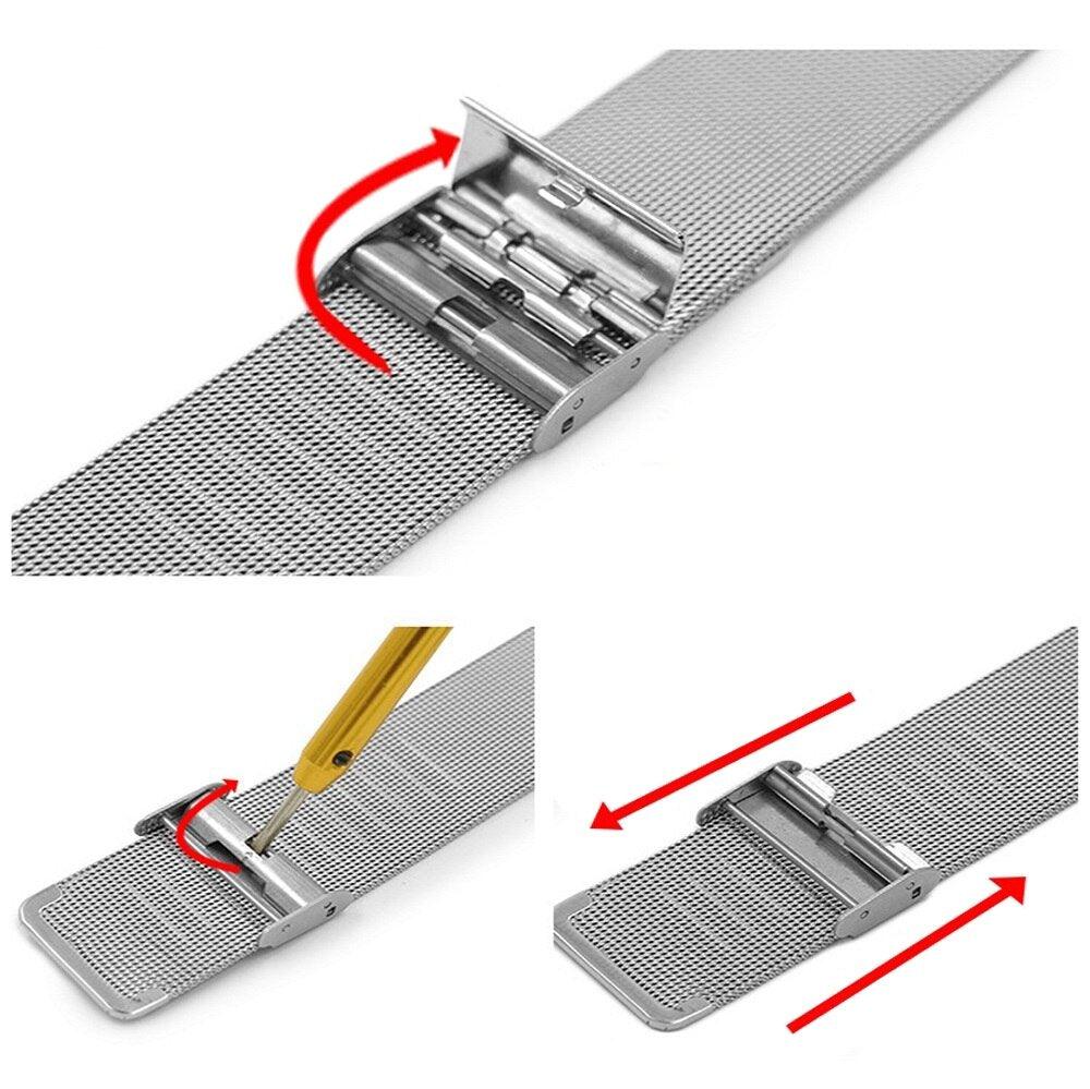 The image displays an HERITAGE Fe 22mm silver mesh watch band with a clasp being adjusted. Red arrows illustrate the movement of the clasp and the adjustment tool used to slide and secure the band.