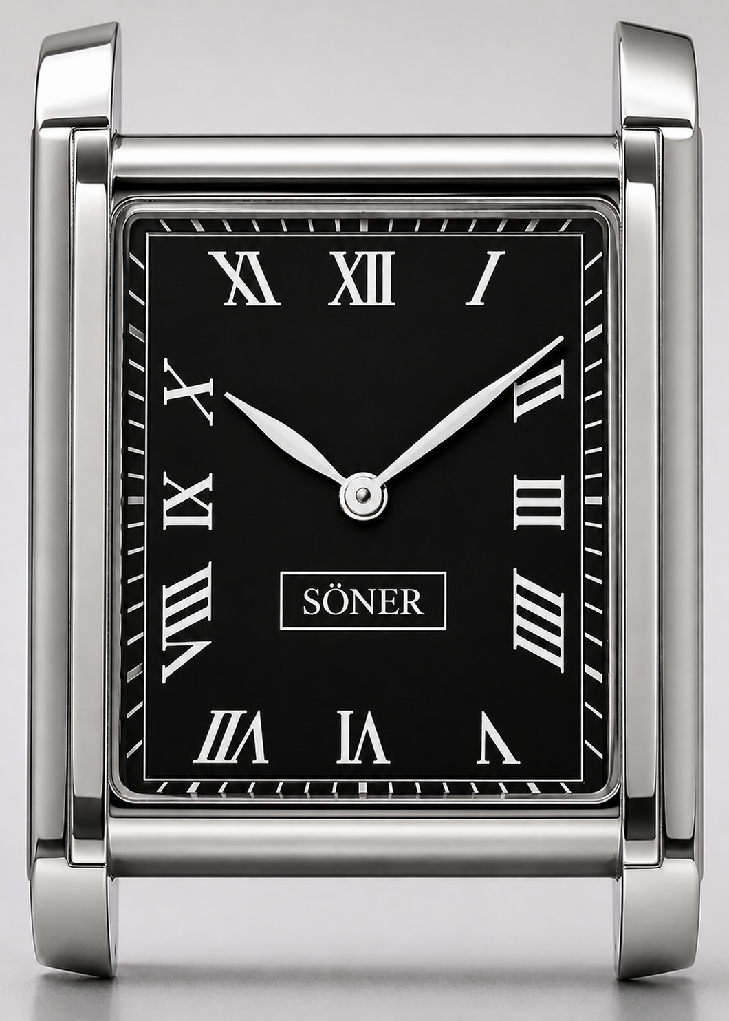 A square, silver-framed desk clock inspired by the classic Tank Watch style, with a black face, Roman numerals, and silver hands. The brand name SÖNER is centered on the clock face. The time shown is approximately 10:10.