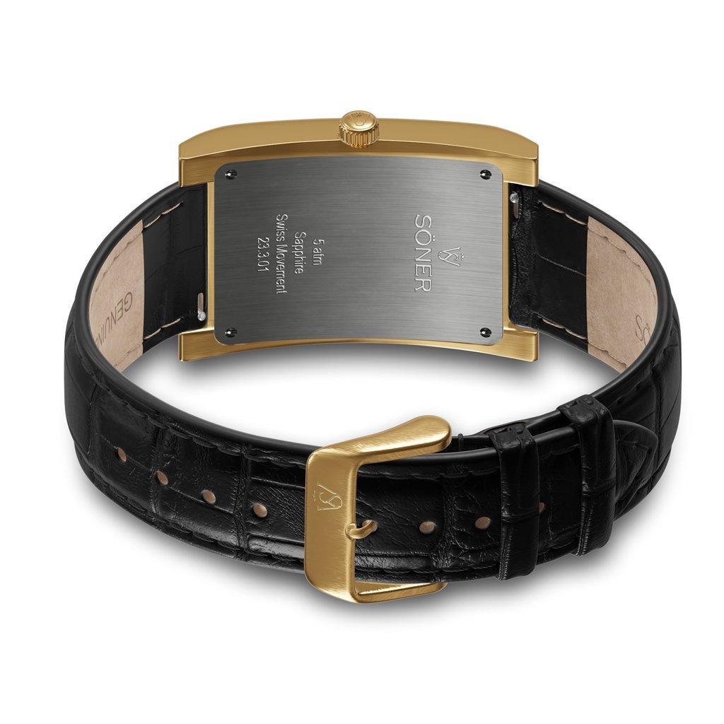 Introducing the Amorous Milano (Self-winding) watch, a sophisticated luxury piece featuring a rectangular gold case and a sleek black leather strap. The back of the watch reveals beautifully engraved details, while the gold buckle accentuates its elegant design, embodying timeless sophistication characteristic of Söner's square watches.