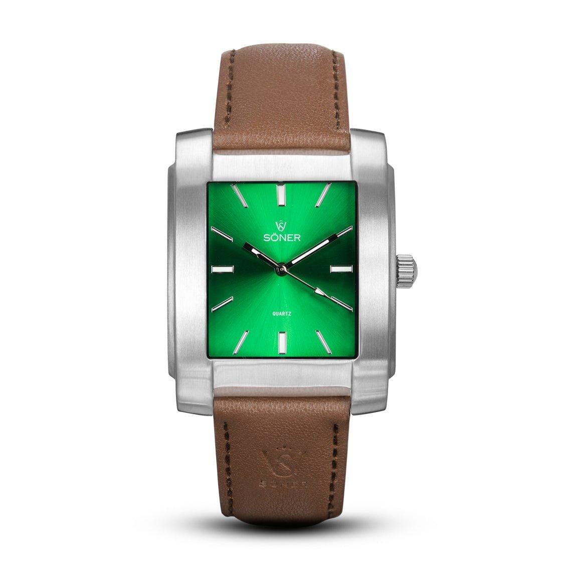 The Legacy Anstey, crafted by Söner, features a square watch design with a green face adorned by silver hour markers and hands. This timepiece boasts a stainless steel case paired with a brown leather strap. Elegantly displaying "SONER" and "Quartz" on its face, this exquisite design merges style and functionality seamlessly.