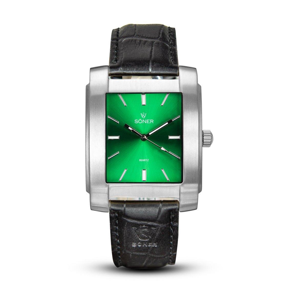 The Legacy Anstey watch from Söner boasts a sleek rectangular design with a green face adorned by silver hour markers and complemented by a black leather strap. Its modern aesthetic is enhanced by the polished stainless steel casing, elegantly displaying the Soner brand name on its sophisticated dial.