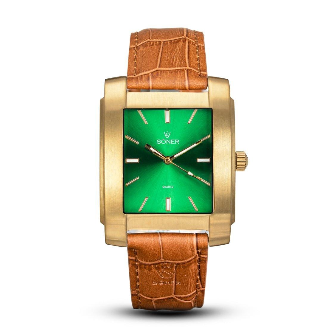 The Legacy Bella (3-year Battery) is a rectangular watch featuring a gold-toned case and a vibrant green face. It boasts quartz movement with elegant gold hour markers, while its brown leather strap sports a crocodile pattern, exuding timeless sophistication.