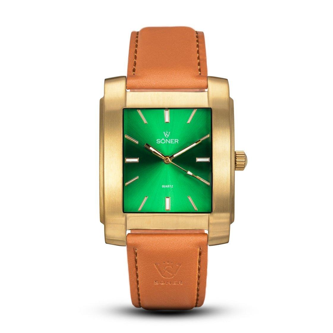 Introducing the Legacy Bella by Söner, this rectangular gold watch features a vibrant green dial with minimalist hour markers. Elegantly labeled Soner, it's complemented by a brown leather strap and a gold crown, offering a modern and sophisticated look. Enjoy peace of mind with its reliable 3-year battery life.