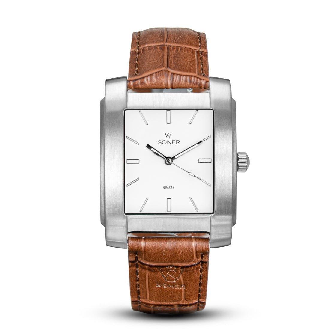 The stylish Legacy Chaillot from Söner Watches boasts a white face with minimalist hour markers. Its refined design is enhanced by a brown leather strap with visible stitching, while the brand name Soner stands out clearly on the watch face.