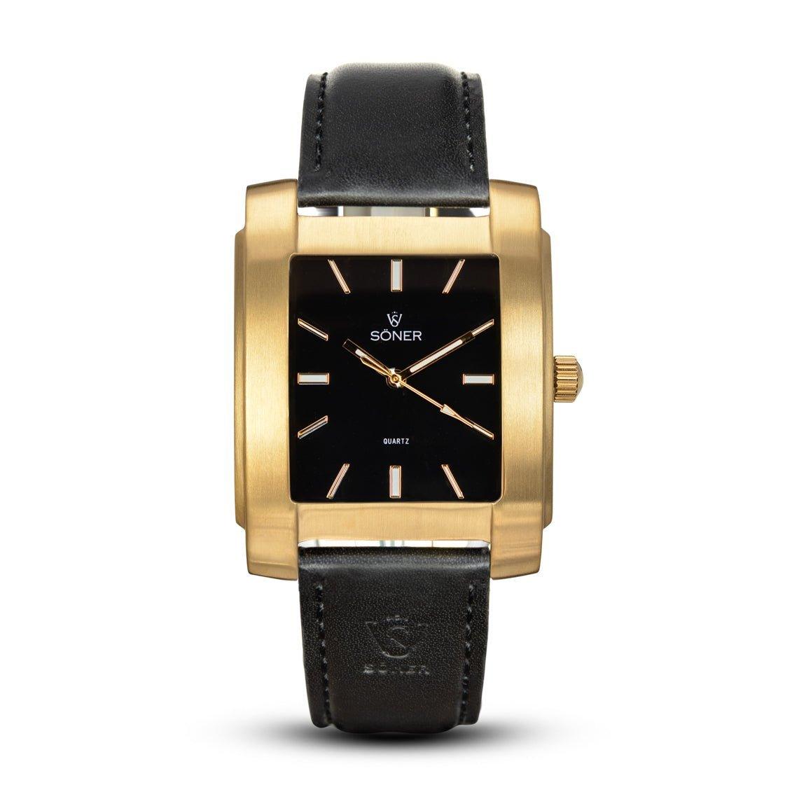 The Legacy Lacerda by Söner is a rectangular gold wristwatch with a sophisticated black face, highlighted by minimalistic gold hour markers and hands. It is elegantly complemented by a black leather strap, with the brand name Soner beautifully displayed on the dial. This timepiece also boasts a 3-year battery life.