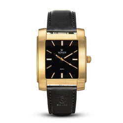 Legacy Lacerda rectangular gold watch with a brushed stainless steel case, black dial, gold-tone hands and indices, and a smooth black leather strap embossed with the Söner logo.