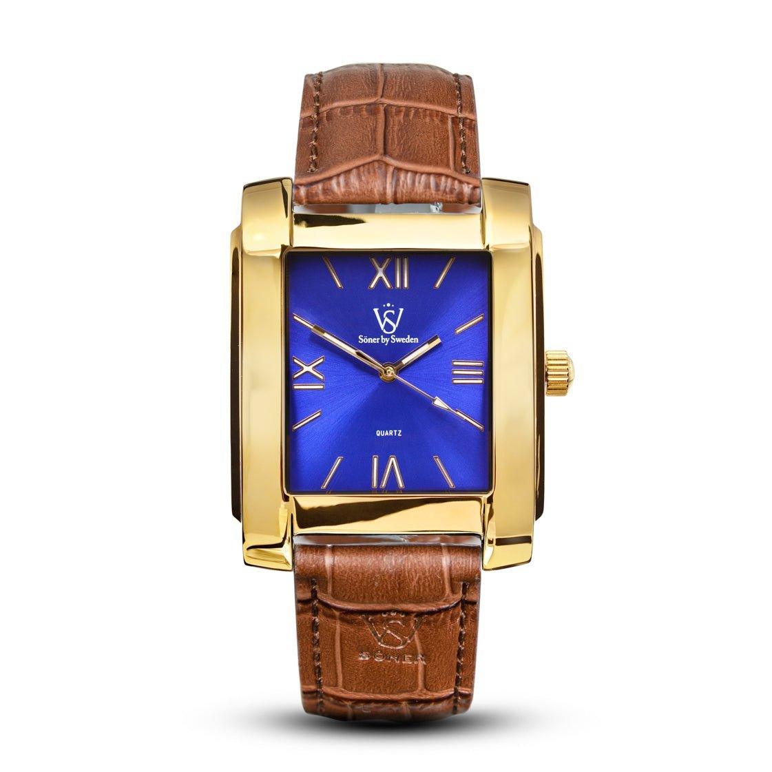 The Legacy Mercado watch, featuring a gold rectangular case, Roman numerals on its blue face, and a brown leather strap from Söner, is showcased against a white background. The hands and markers are elegantly gold-toned.