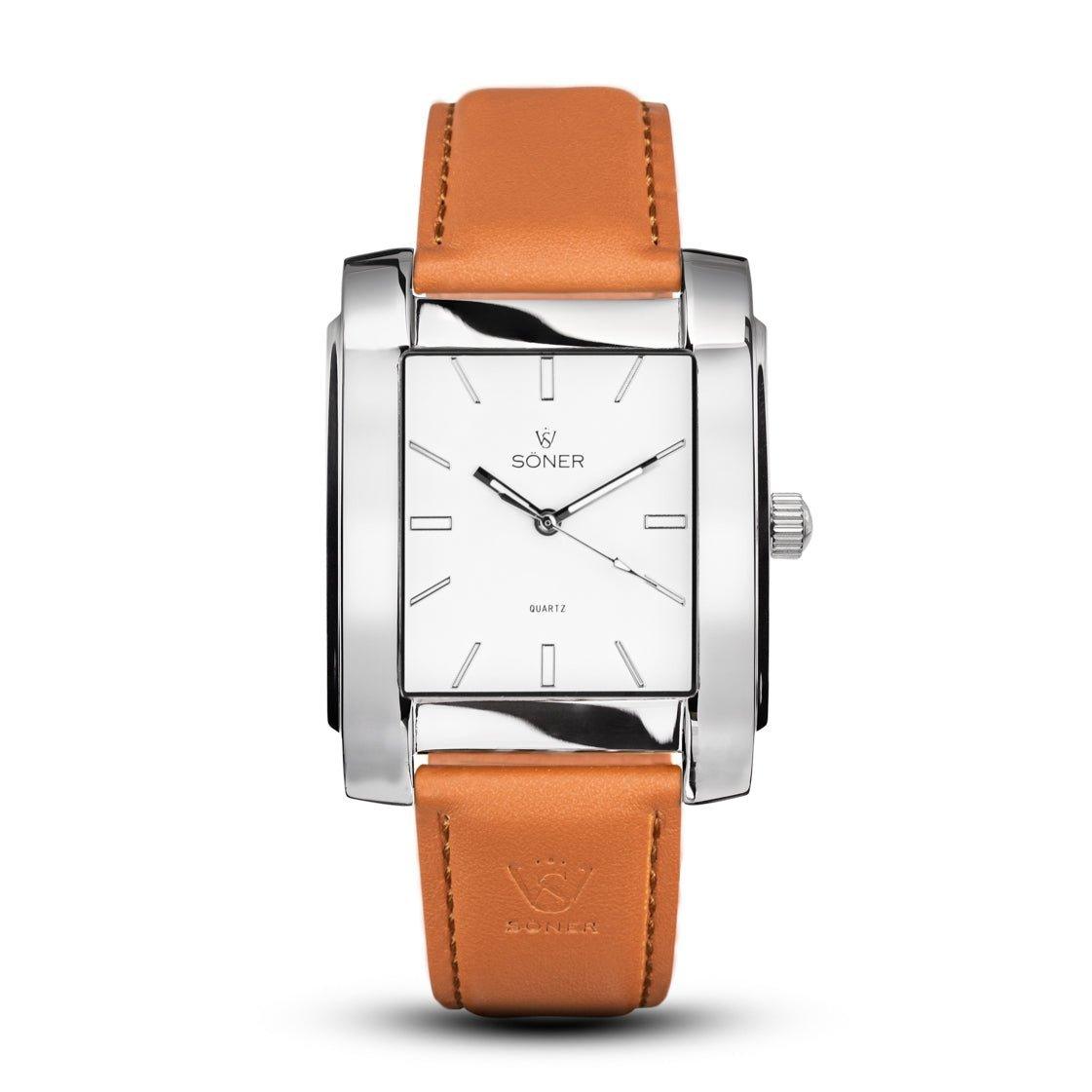 The Legacy Prisma (3-year Battery) watch, with its silver rectangular case, showcases a white dial featuring minimalist hour markers and proudly displays the Soner brand name. It comes with a tan leather strap and has a small crown on the side, with its hands elegantly pointing at 10:09.