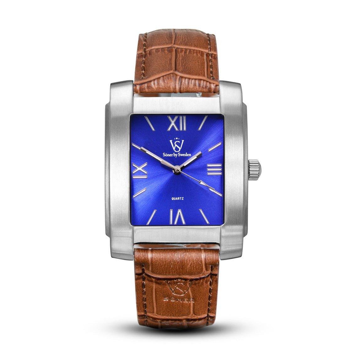 The Legacy Stoclet watch by Söner is a stylish square timepiece, showcasing a silver case and a vibrant blue dial with Roman numerals. It features a brown leather strap and prominently displays the brand’s logo and name on the dial.