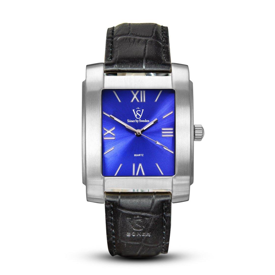 The Legacy Stoclet wristwatch from Söner features a rectangular silver case paired with a black leather strap and an eye-catching blue dial. With silver Roman numerals and two hands, it showcases a sleek, modern design. Enjoy its reliability with a 3-year battery life.