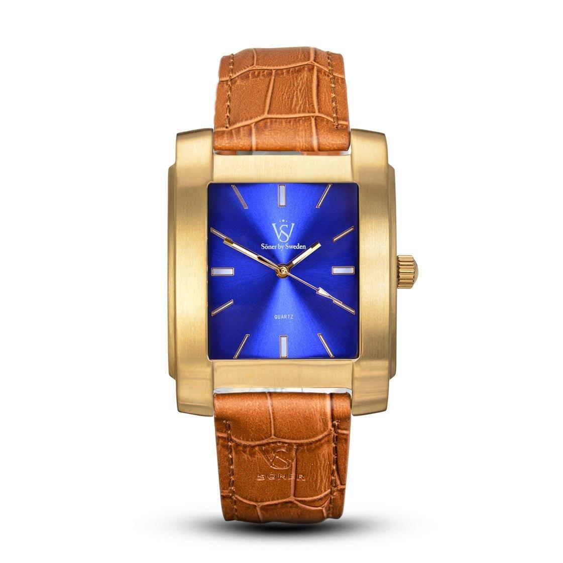 Introducing the Legacy Tobacco by Söner: This exquisite square timepiece features a gold casing, a vibrant blue face, and elegant gold hour markers and hands. It's beautifully complemented by a textured brown leather strap, offering both style and function with its 3-year battery life.