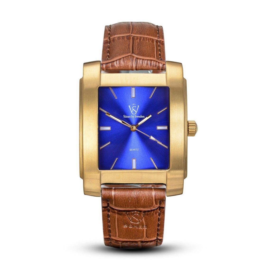 The Legacy Tobacco wristwatch boasts a sleek gold rectangular case with a striking blue face, complemented by gold hands and hour markers. It comes with a brown leather strap featuring an intricate textured pattern. This watch embodies a sophisticated and timeless design akin to the exquisite craftsmanship found in Söner square watches.