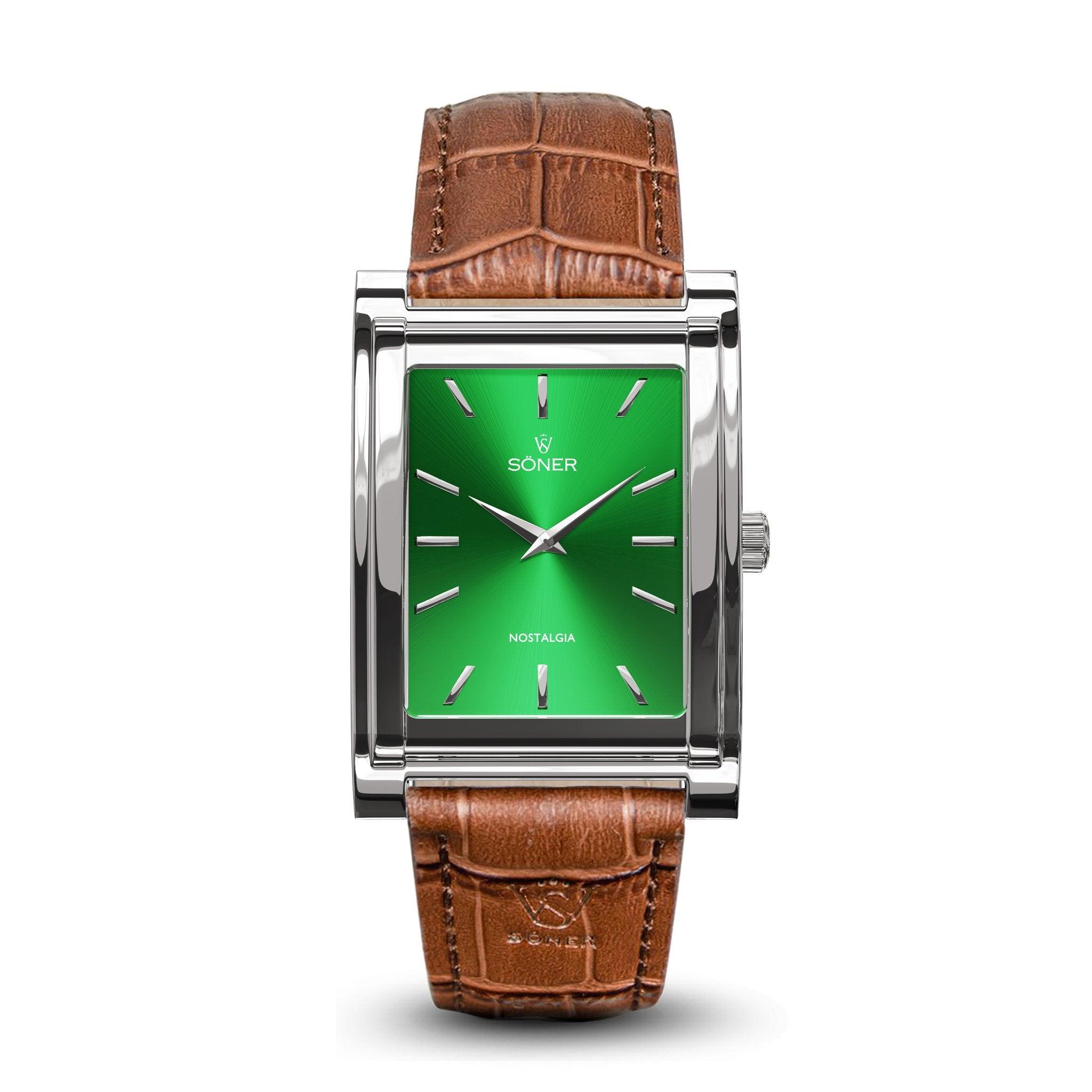 The Nostalgia New York watch features a rectangular design with a shiny silver case, complemented by a green dial adorned with silver hour markers and the name NOSTALGIA prominently displayed. Part of Söner's collection, this exquisite timepiece includes a brown leather strap with a textured pattern, seamlessly blending classic elegance with modern style. Plus, it boasts an 11-year battery life.