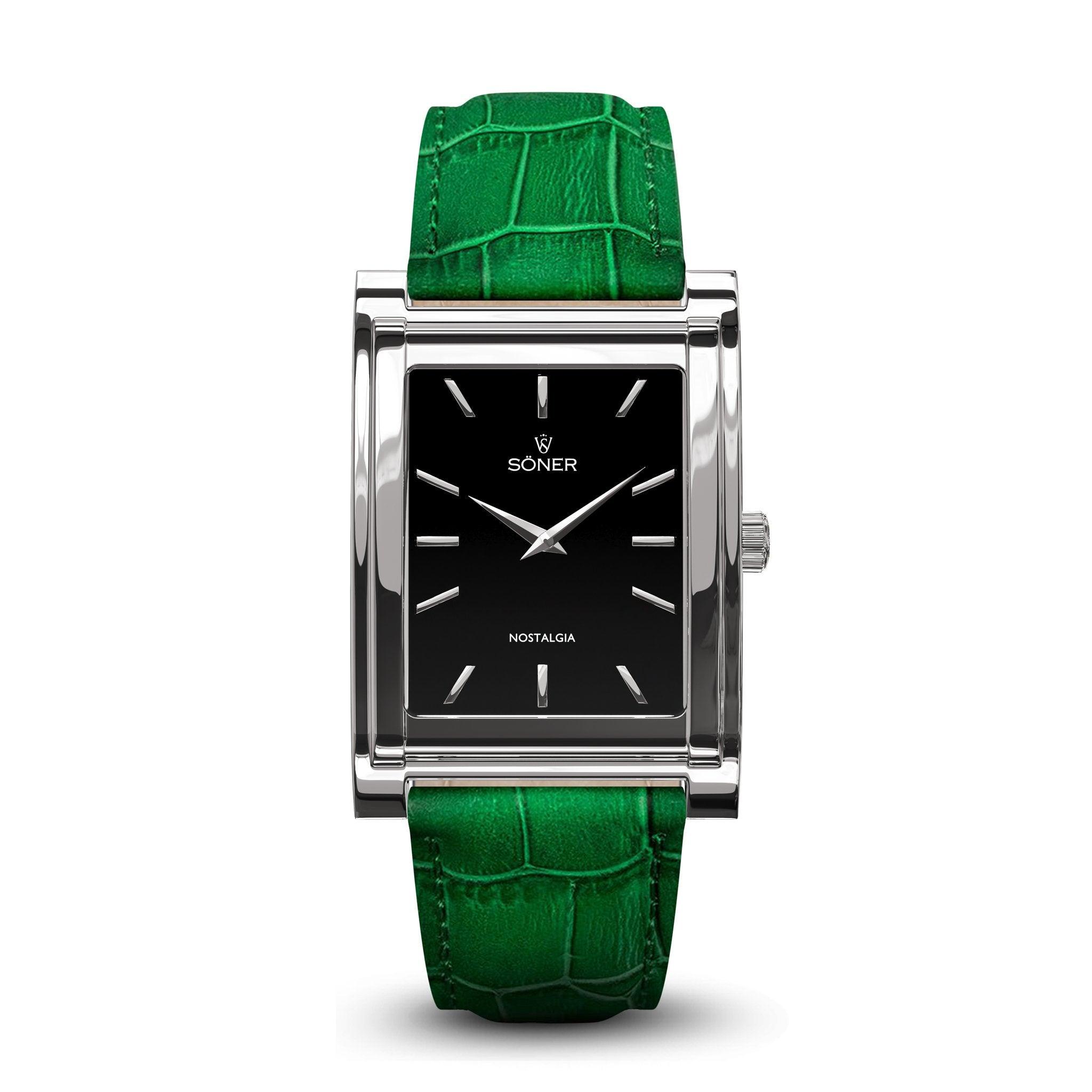 The Nostalgia Stockholm (11-year Battery) rectangular watch showcases a sleek silver frame and a black face with minimalist silver hour markers and hands. A vibrant green crocodile-patterned leather strap enhances its flair, while the Soner logo is prominently displayed on the dial above "Nostalgia," making this watch an eye-catching statement piece.