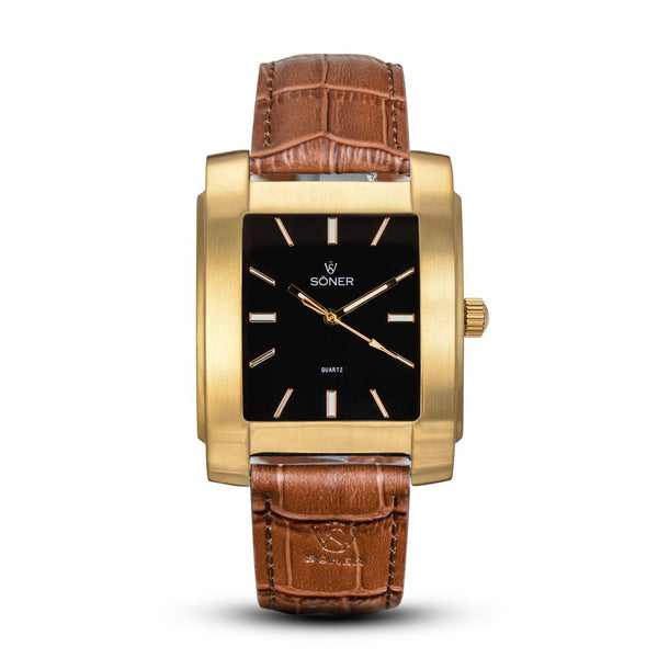 Glocke, a square watch from söner watches with a brushed gold case and a onyx black dial | Dark brown alligator strap.